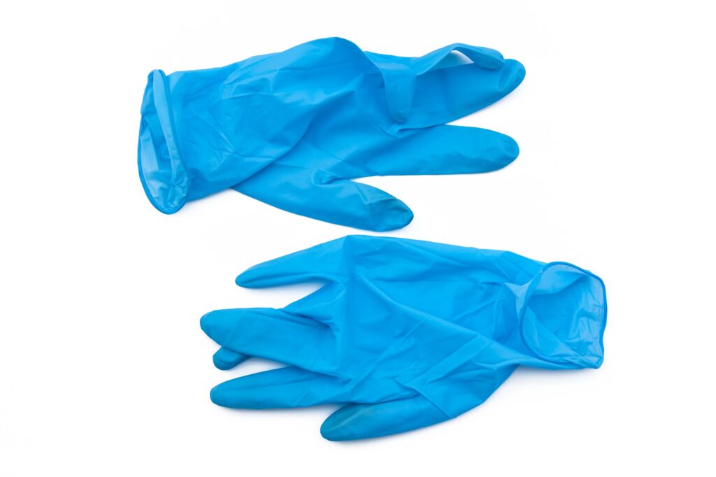 Covid-19 disposable contaminated gloves. Coronavirus latex plastic rubbish